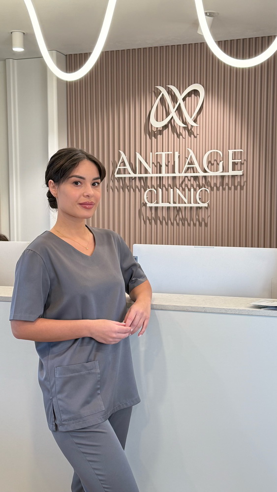 Толмач Анна